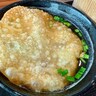 【丸亀製麺】栃木のご当地つけ汁「餃子風肉つけ汁」にのっている巨大な餃子の皮について